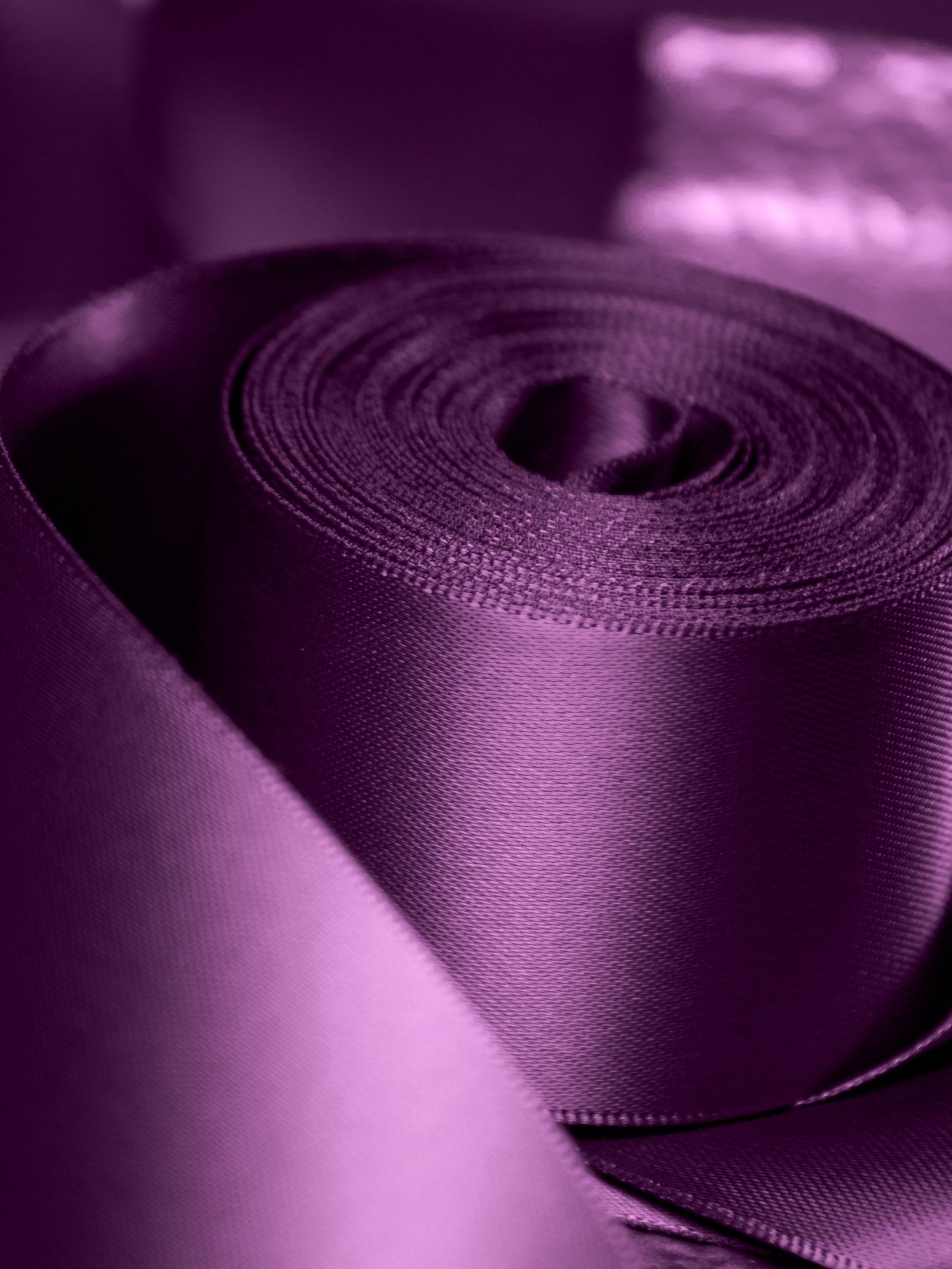 Plum double faced satin gift wrapping ribbon for gifts, weddings, and special occasions