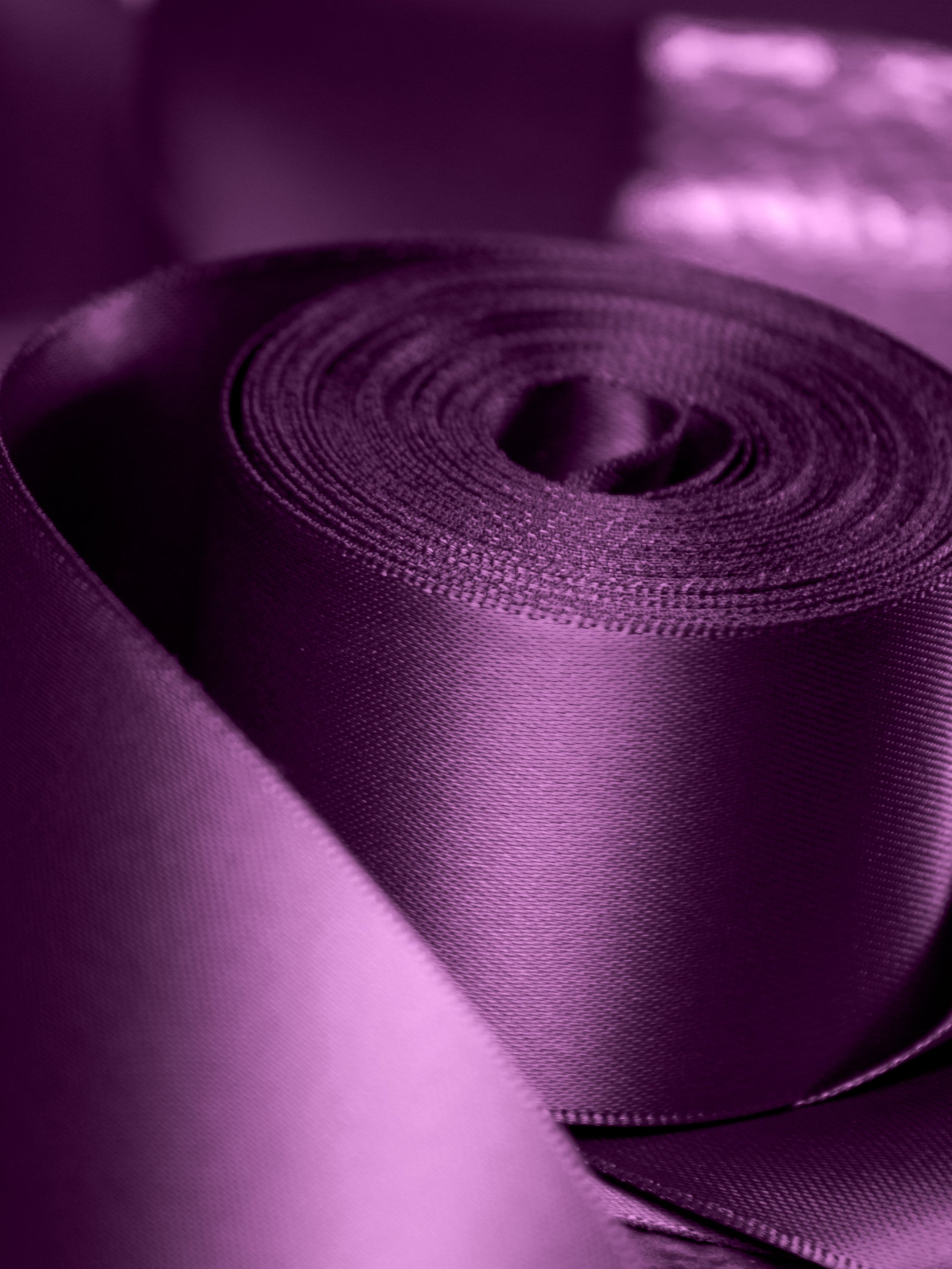 Plum double faced satin gift wrapping ribbon for gifts, weddings, and special occasions