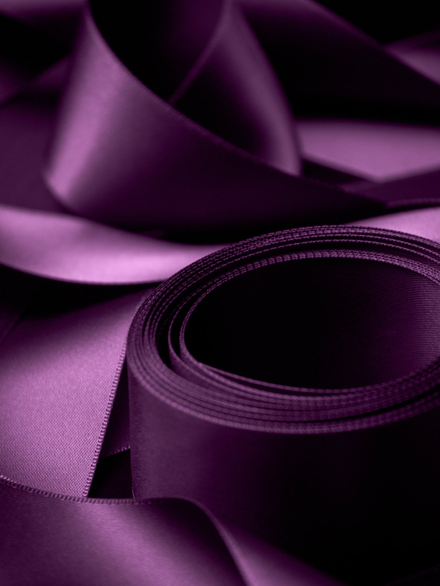 Plum 1.5 inch satin ribbon styled for luxury gift wrapping and elegant bows