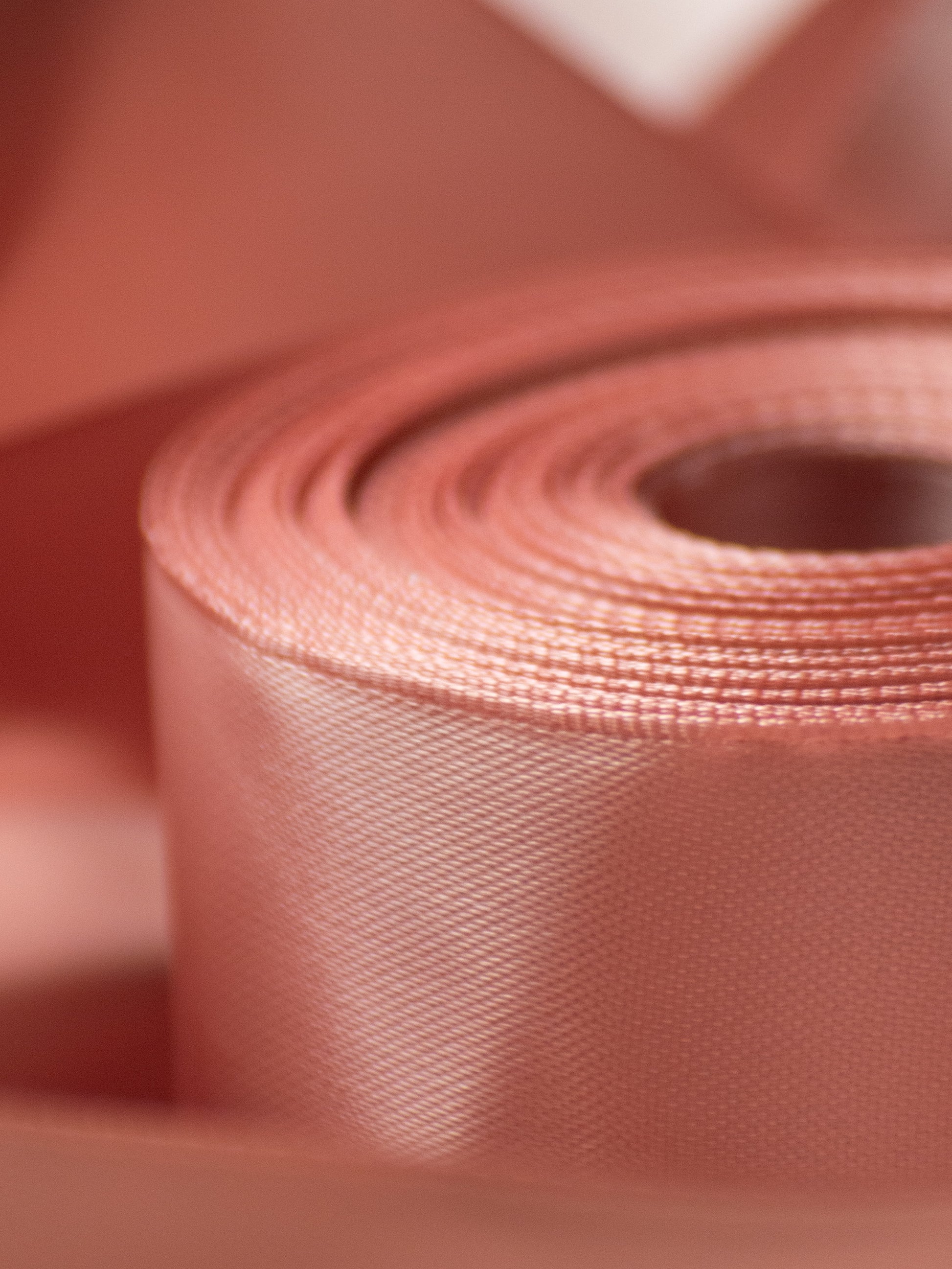 rose gold satin ribbon spool detail, 1.5 inch ribbon for elegant bows and refined packaging